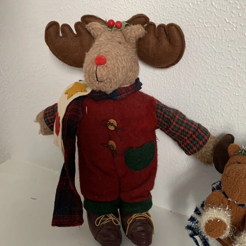 Two really cute and fun moose.